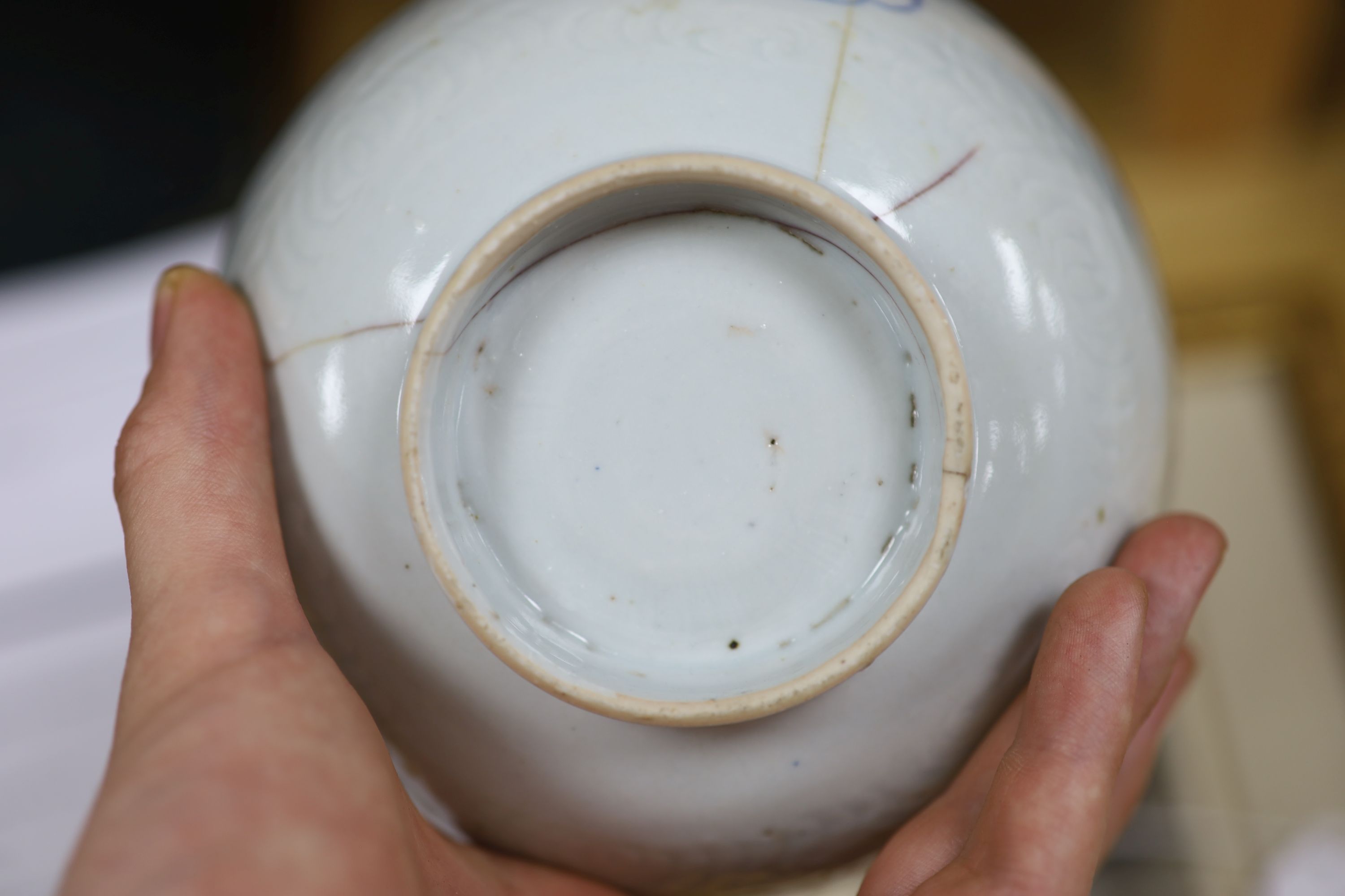 A Chinese blue and white bowl, diameter 15cm, a tea bowl and saucer, a crackleglaze shell dish and a celadon glazed stem cup